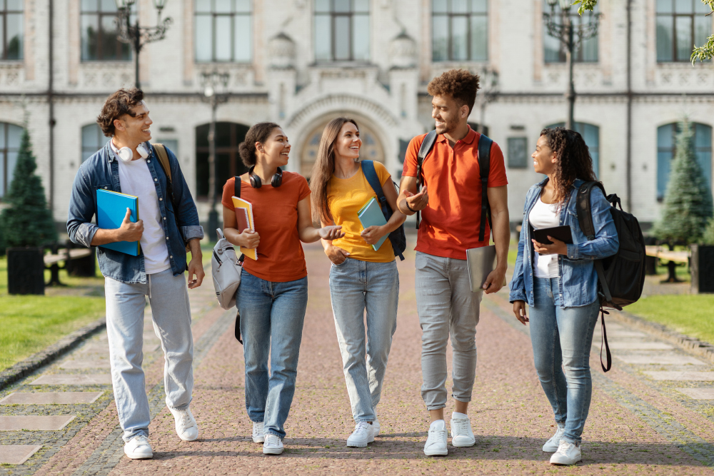 group of college students walking on campus